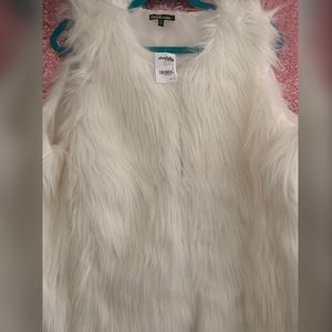 White fur vest